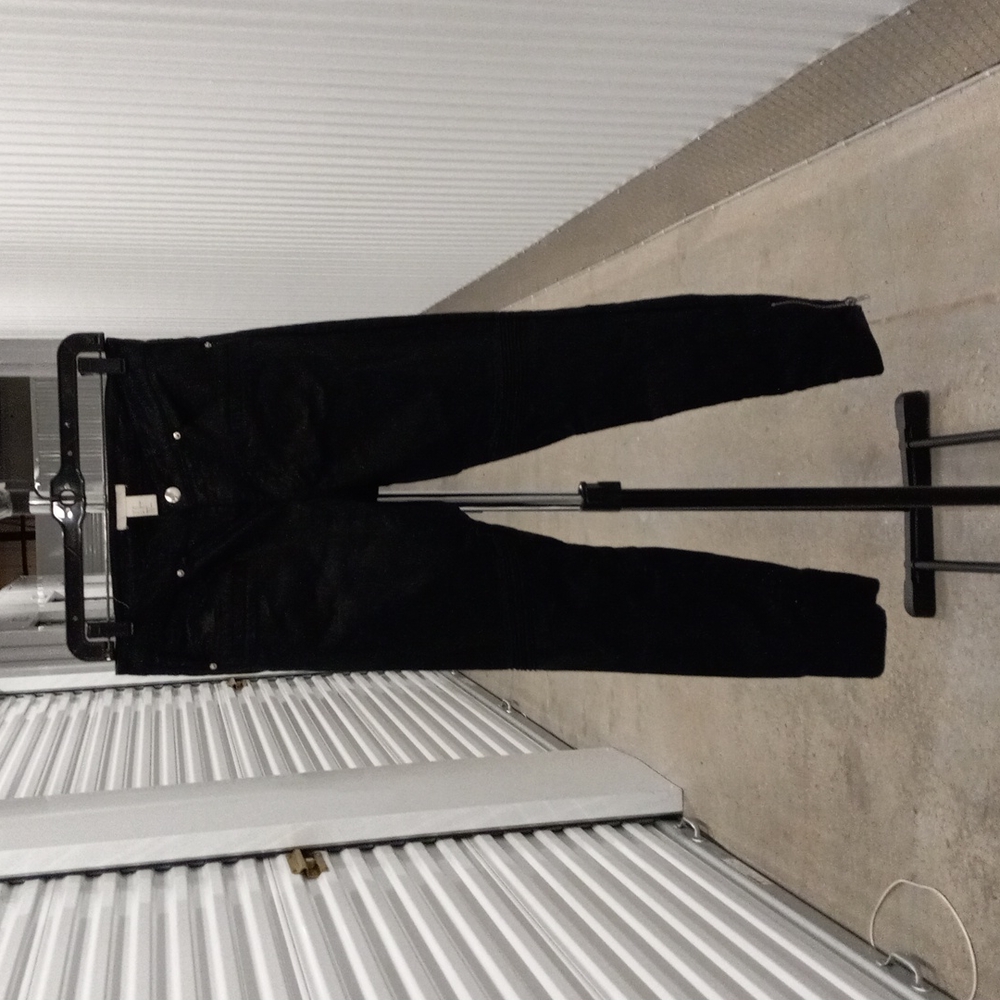 Black straight legged pants.